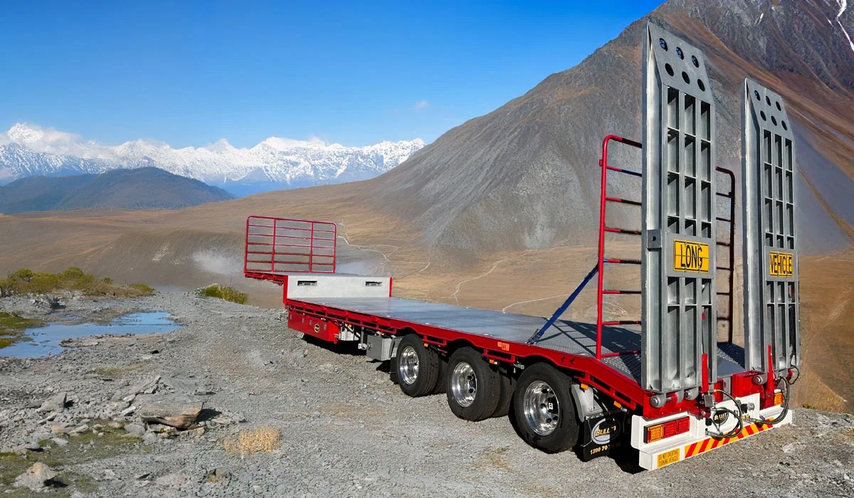 a red drop deck trailer